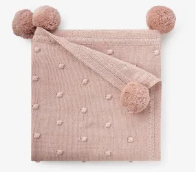 Popcorn stitch blush baby blanket with pom pom edges